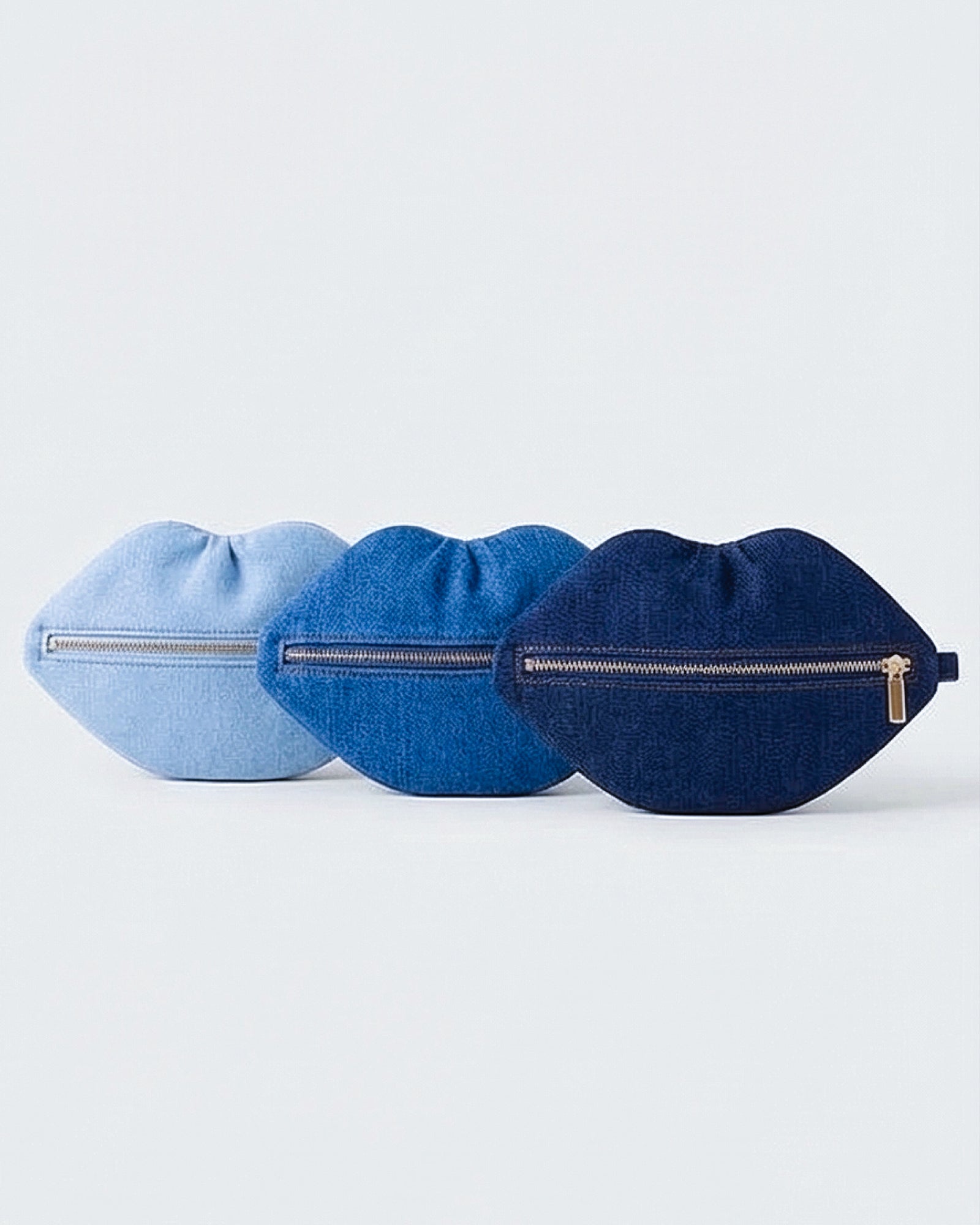 The Blake — Light Blu Denim Lip Pouch — lip-shaped makeup pouch by David Stesner ArtHouse — lifestyle view