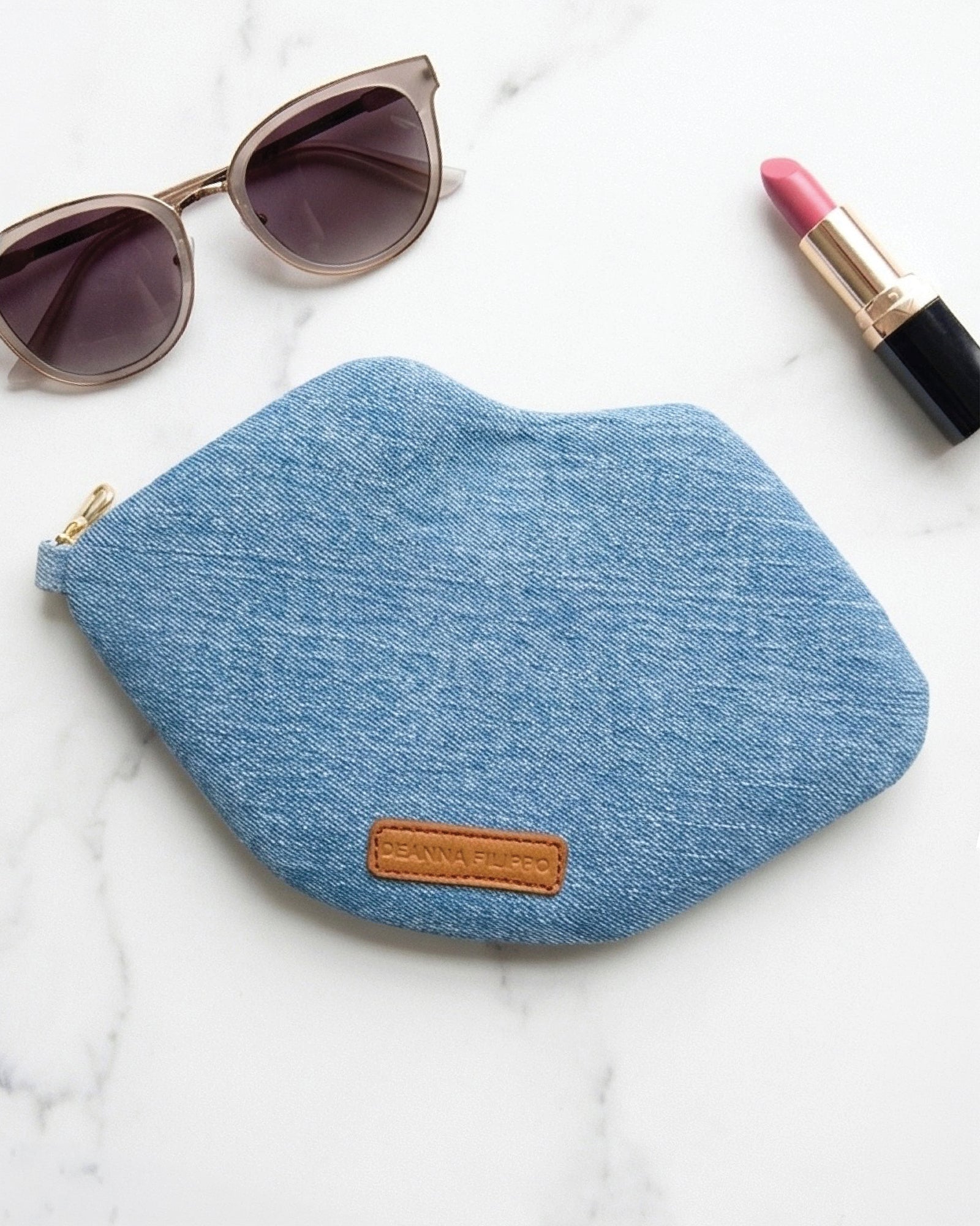 The Blake — Light Blu Denim Lip Pouch — lip-shaped makeup pouch by David Stesner ArtHouse — lifestyle view