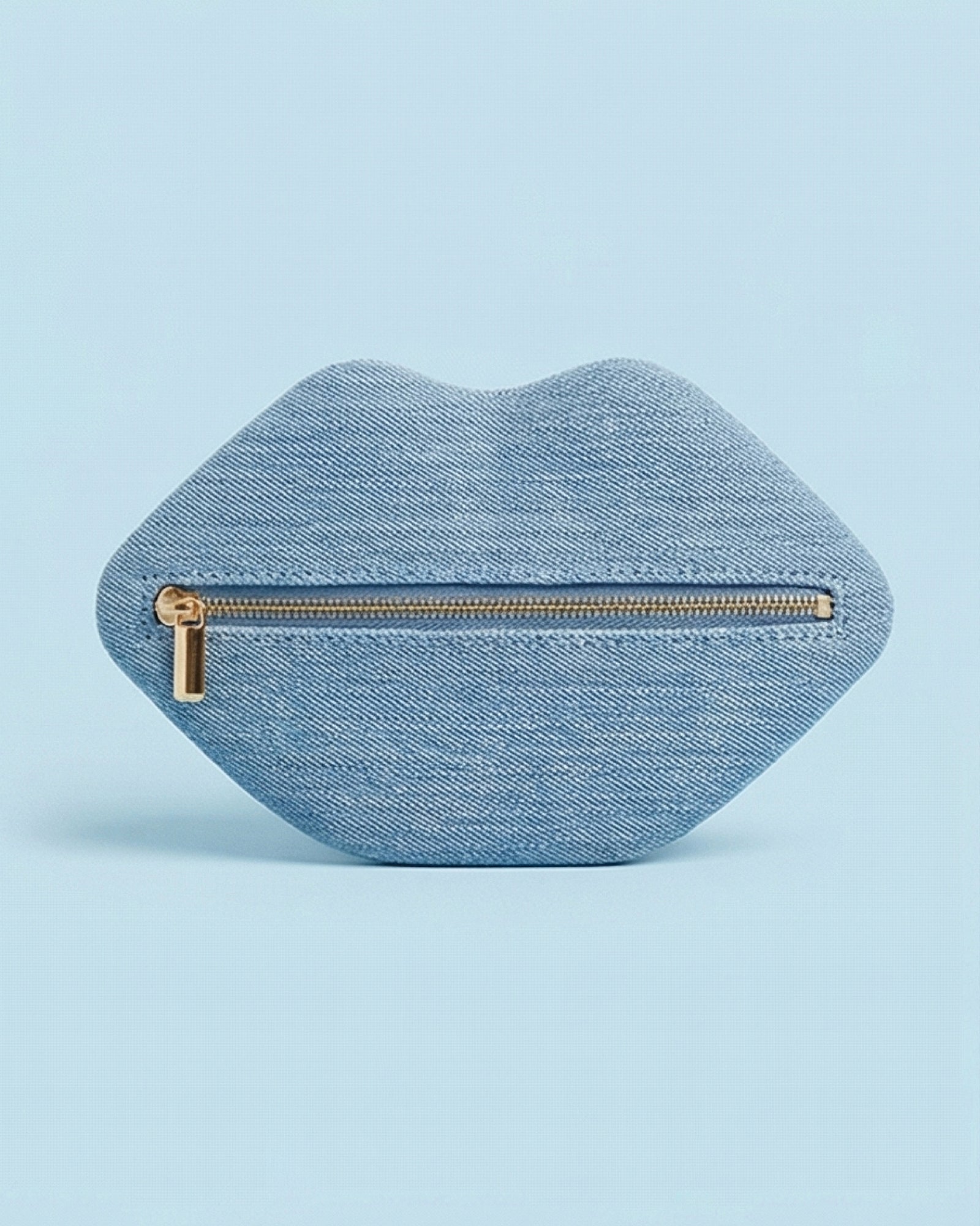 The Blake — Light Blu Denim Lip Pouch — lip-shaped makeup pouch by David Stesner ArtHouse — lifestyle view