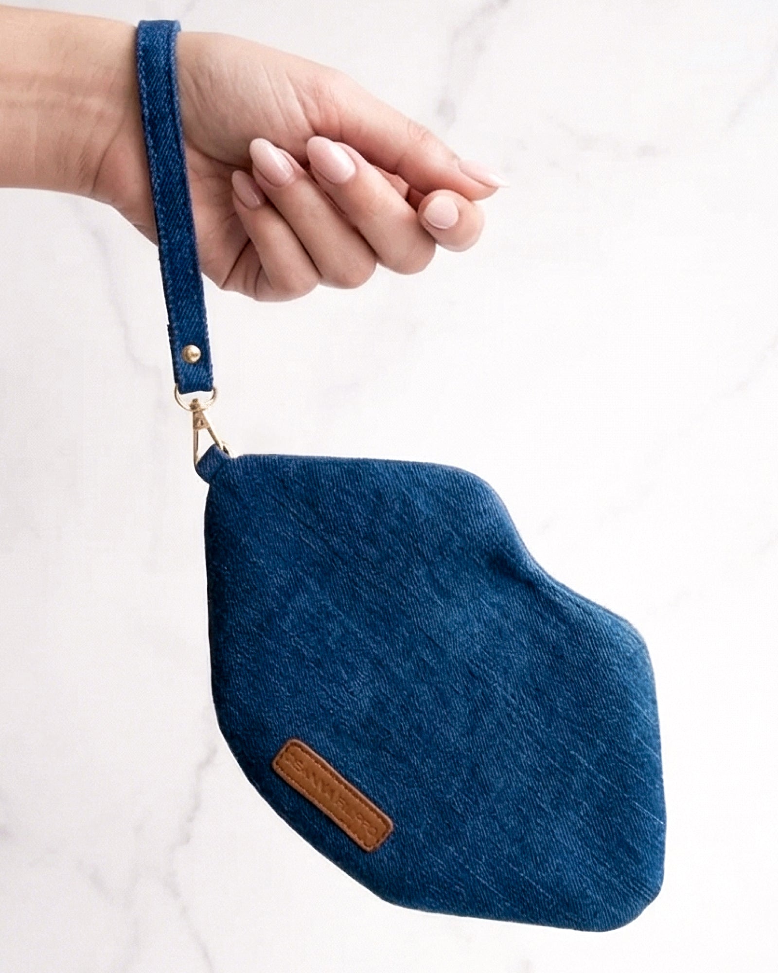 The Blake — Deep Blu Denim Lip Pouch — lip-shaped makeup pouch by David Stesner ArtHouse — lifestyle view