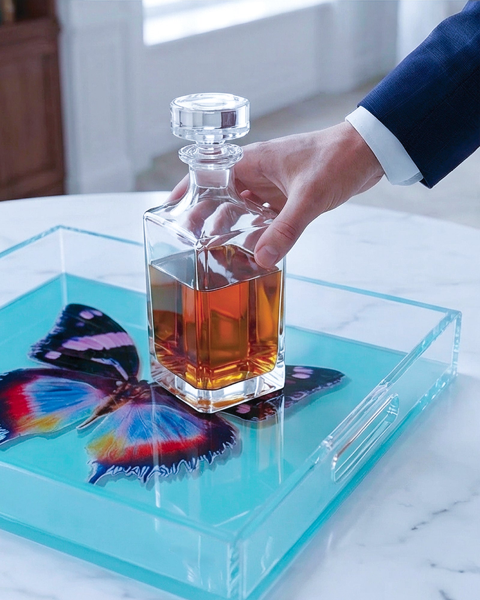 Aquamarine Papillon by David Stesner ArtHouse — turquoise black square acrylic trays, top-down view