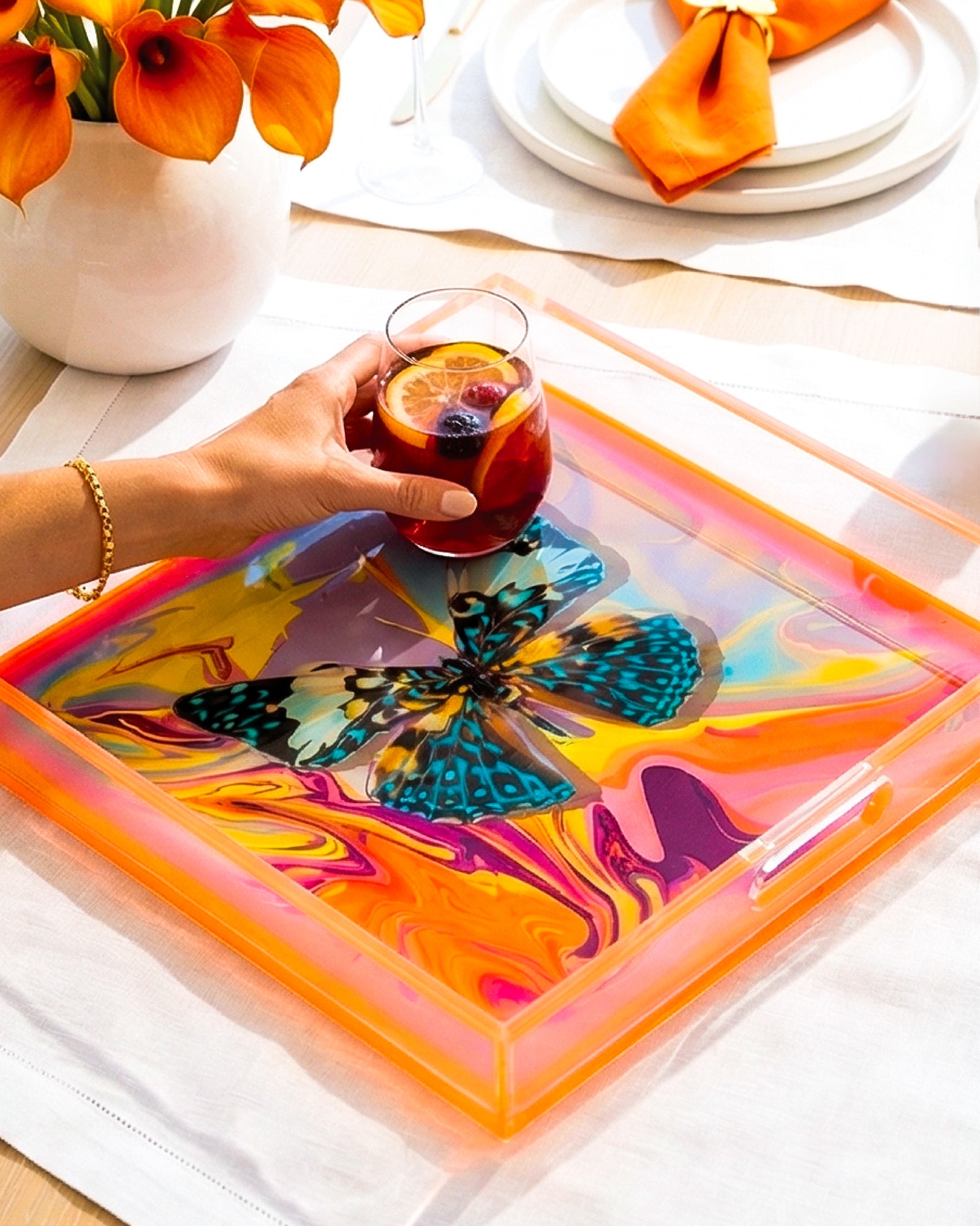 Reef Fly Swirl by David Stesner ArtHouse — multicolor blue square acrylic trays, styled view